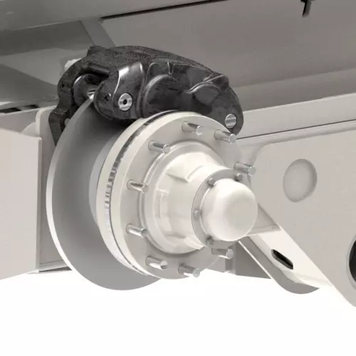 A SL 124 with a lid on the manure spreader.