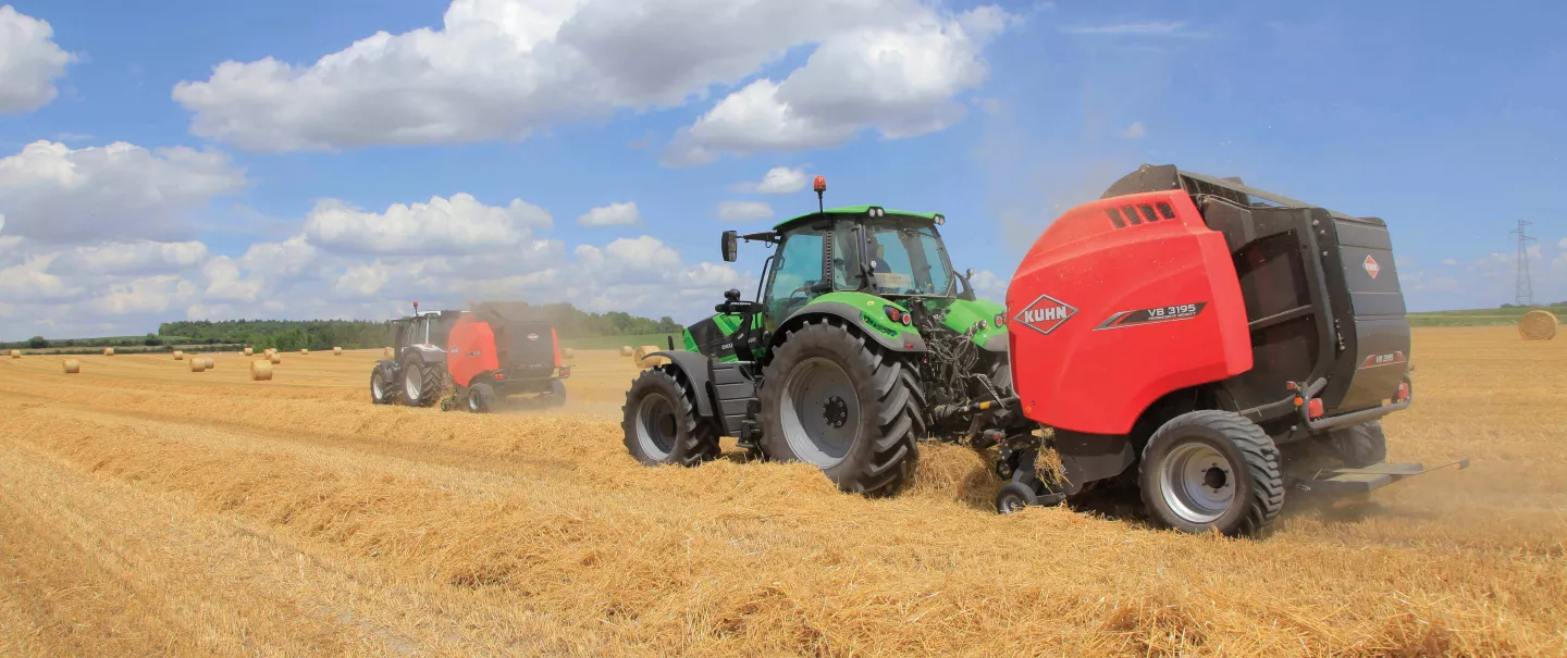 A VB 3195 following another VB 3195 in the field baling straw